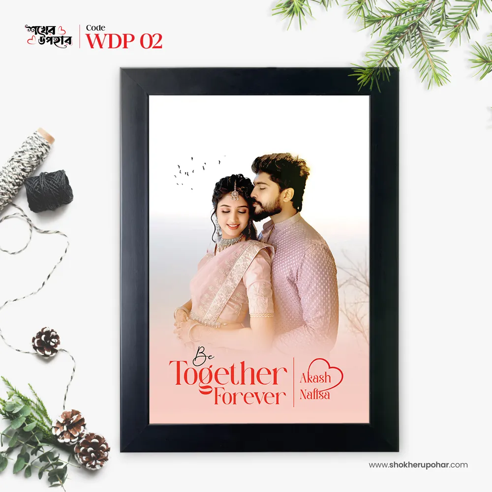 Woman standing wearing dark blue kurti and jeans light grey background